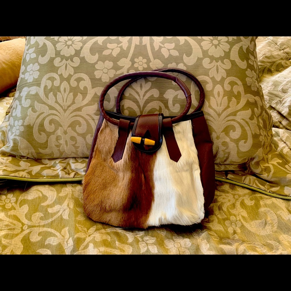 Springbok skin and leather top handle purse